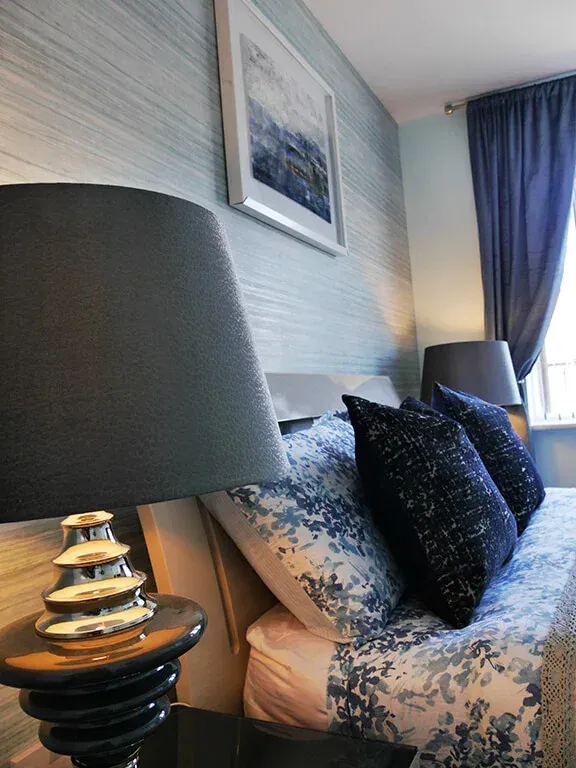 Navy-toned bedroom — Ritu, Wimbledon apartment